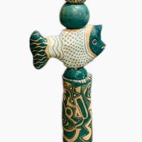 Associates in Teal by Zimmerman – full 70-inch view of bird, face, fish, and geometric forms unified by teal palette reading as single world from across room