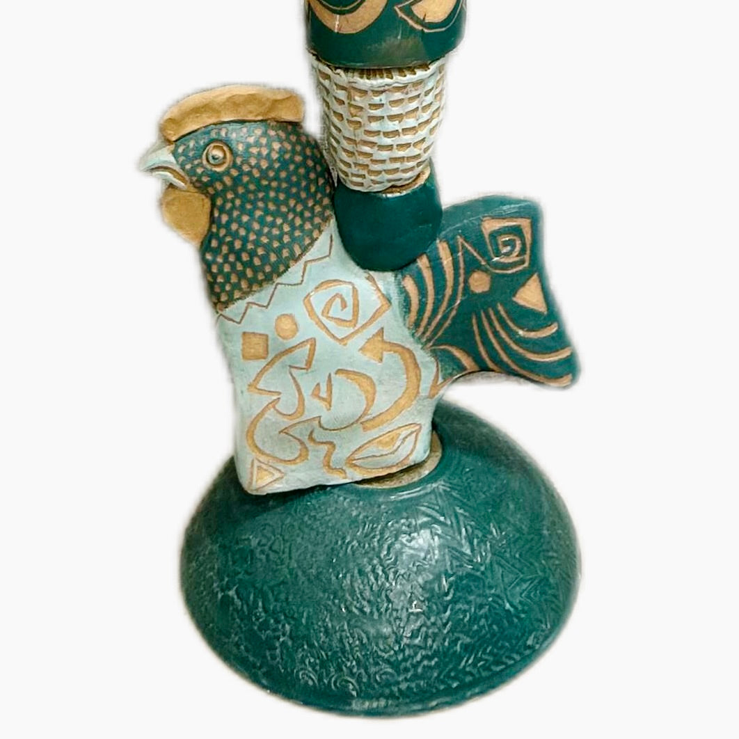 Associates in Teal by Zimmerman – close-up of face looking out with quiet authority amid teal glaze and printmaker-trained mark language