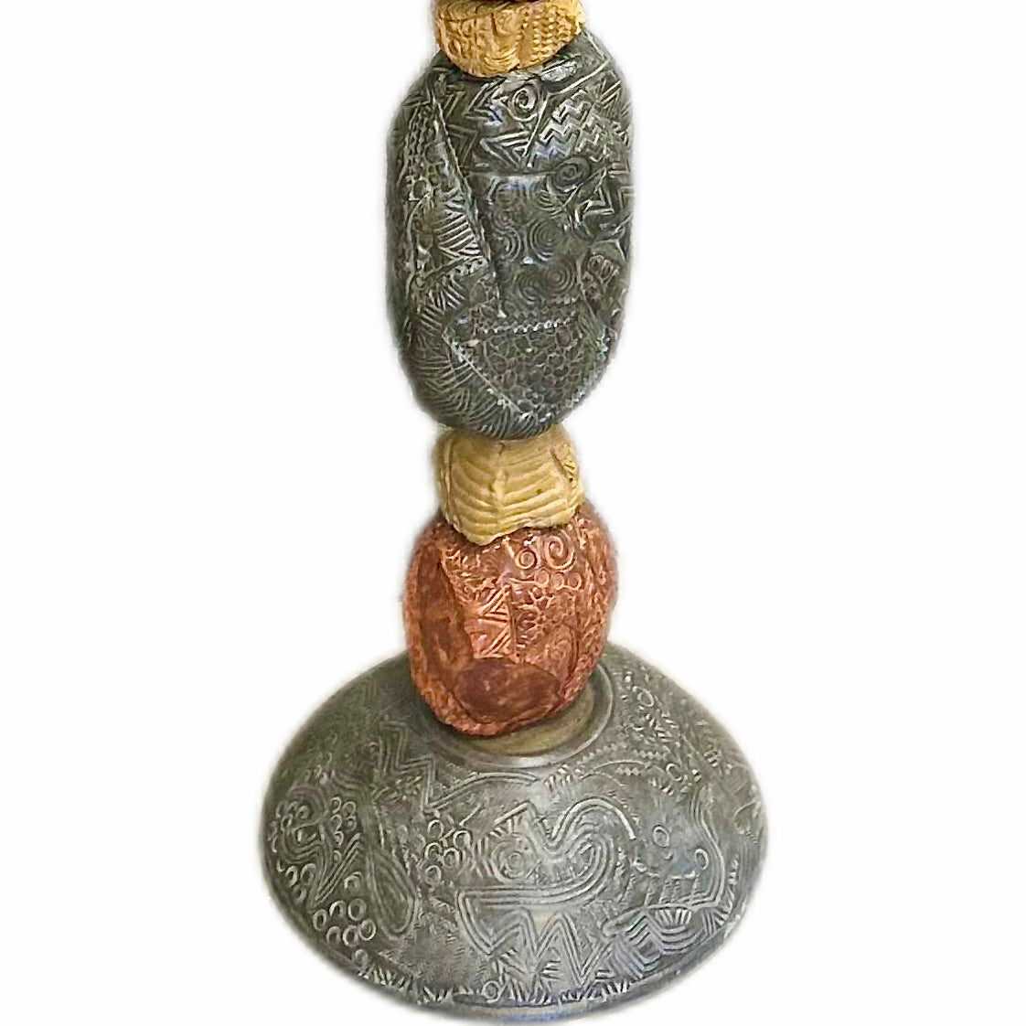 Stone Perch 1 by Zimmerman – close-up of coral-bronze forms with spirals and botanical marks alternating with charcoal in 71-inch ceramic statement