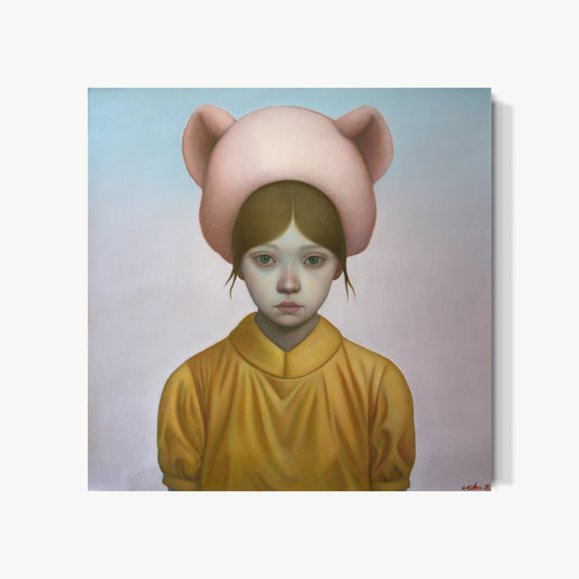 A Moment of Silence – oil painting by Zhu of child in mustard-yellow jacket wearing oversized pink bear hat, direct inward gaze aware of being seen but unmoved, stillness as emotional complexity without easy sentiment