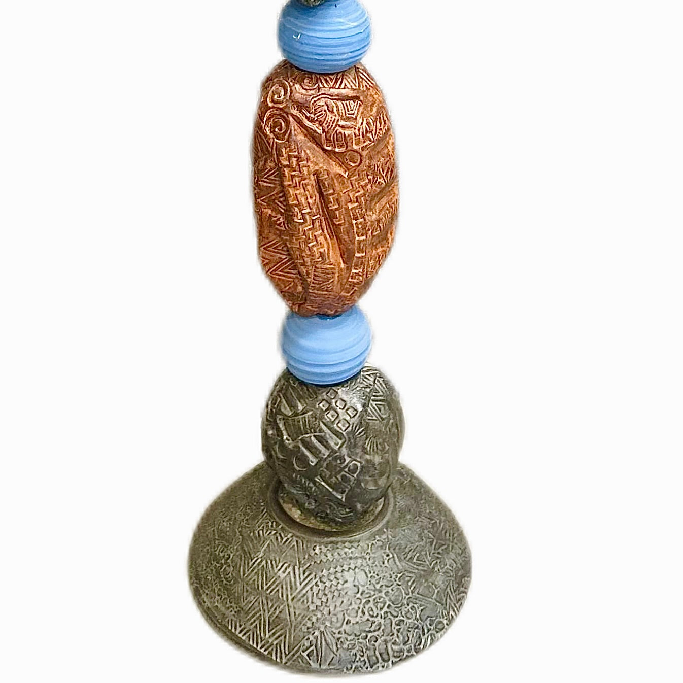 Stone Perch 4 by Zimmerman – close-up of copper-bronze warmth and calm direct face in hand-built ceramic that feels alive in changing light