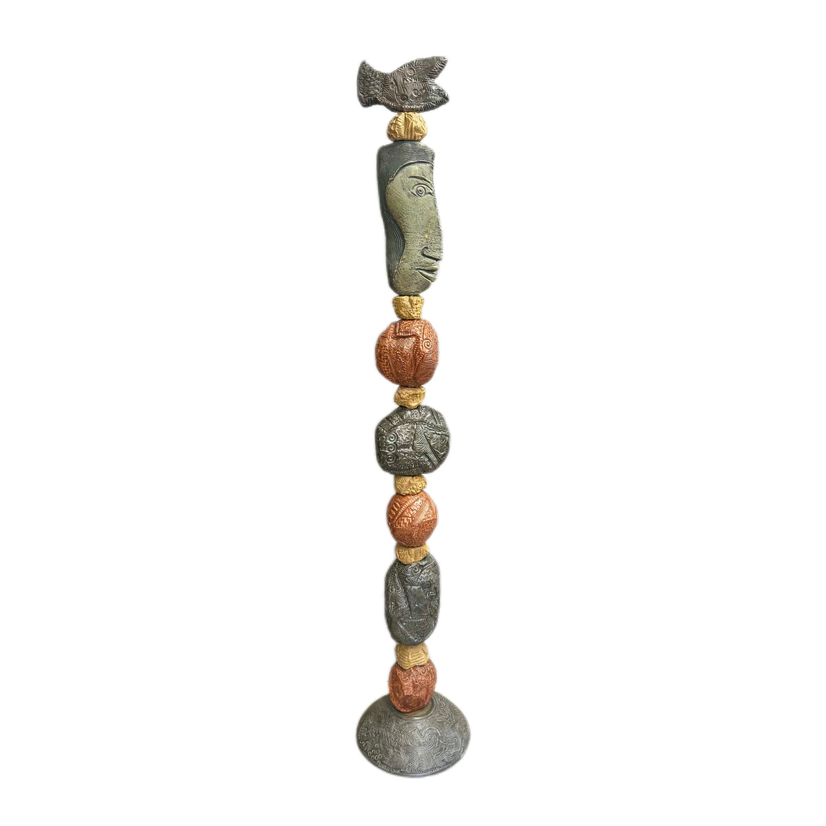 Stone Perch 1 Ceramic Totem – 71-inch hand-built ceramic totem by Zimmerman with flat fish at crown mapped in incised geometric marks, long sideways-looking face below, alternating coral-bronze and charcoal forms with spirals and botanical marks on patterned disc base