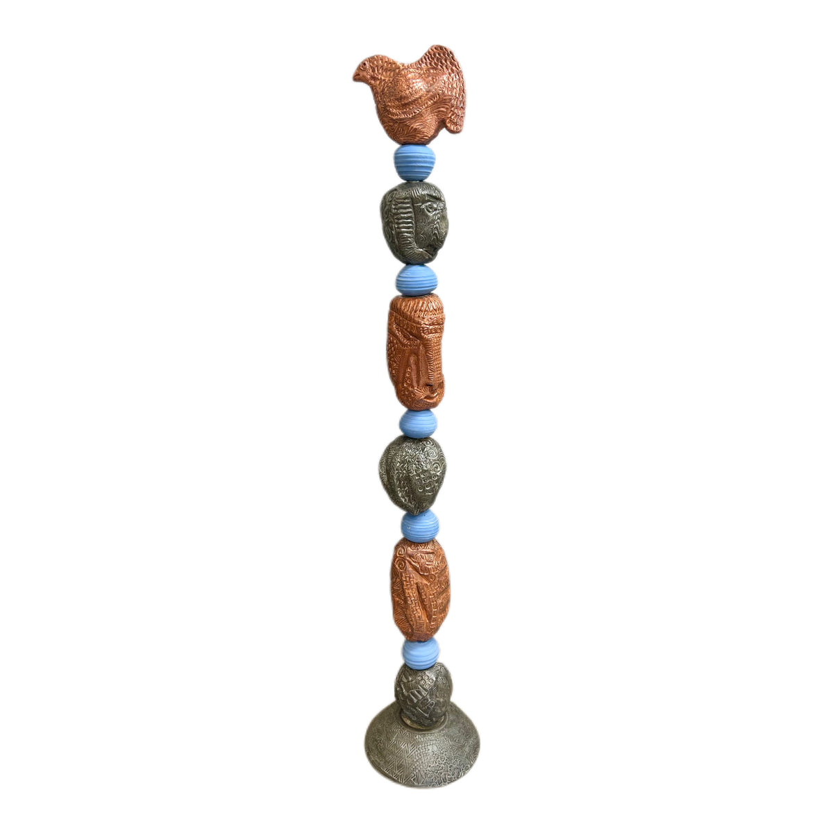 Stone Perch 4 Ceramic Totem – hand-built ceramic totem by Zimmerman with plump layered-scale bird at crown, copper-bronze and slate forms in easy rhythm below, calm direct face near middle, drawing you toward it before you have decided to move