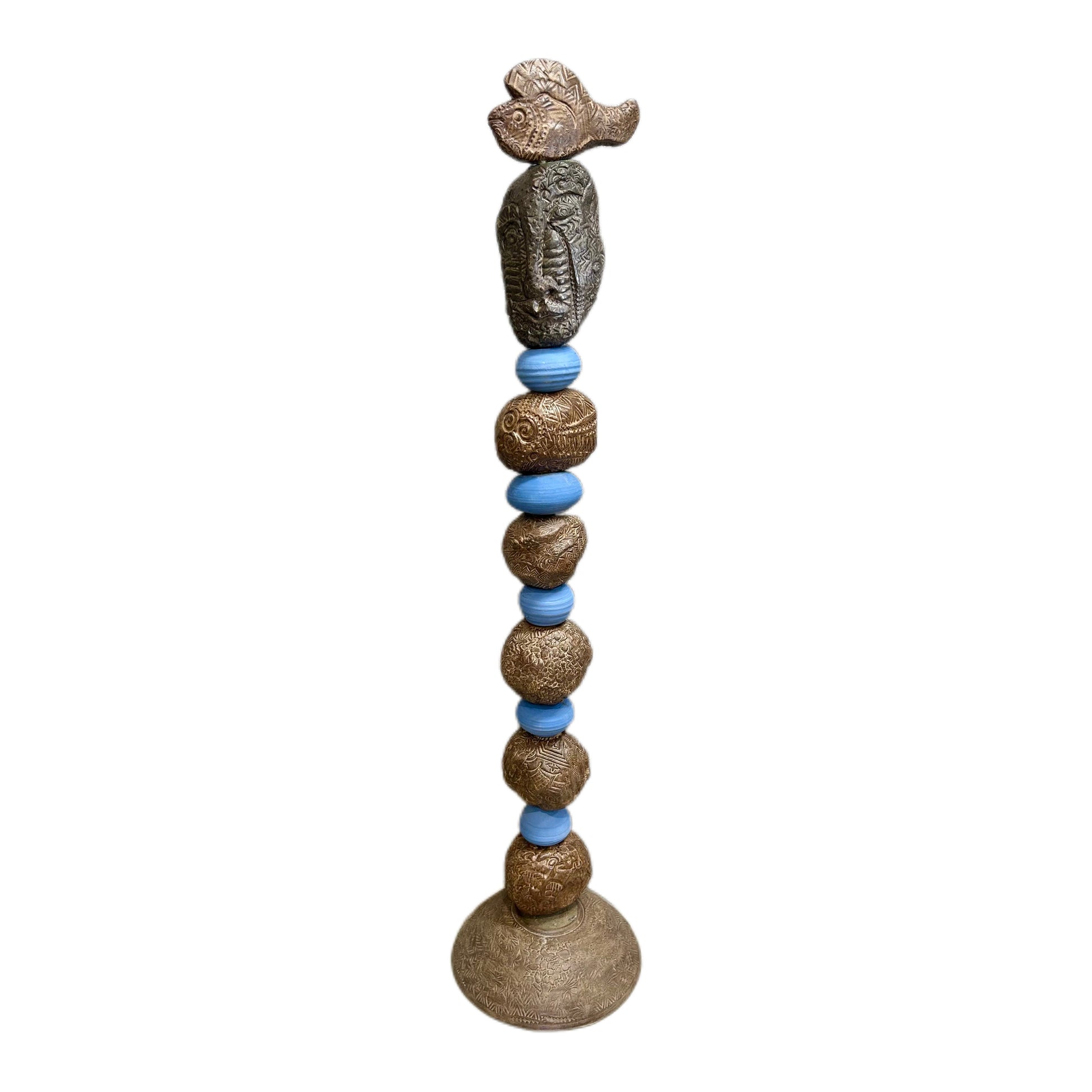 Stone Perch 5 Ceramic Totem – hand-built ceramic totem by Zimmerman with smooth periwinkle blue forms alternating with richly textured bronze spheres, fish and figure at top with incised lines shifting as you move around, patterned base and surfaces different at dusk than dawn