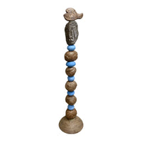 Stone Perch 5 Ceramic Totem – hand-built ceramic totem by Zimmerman with smooth periwinkle blue forms alternating with richly textured bronze spheres, fish and figure at top with incised lines shifting as you move around, patterned base and surfaces different at dusk than dawn