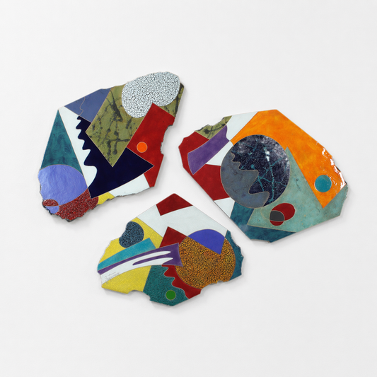 The Edge of Time Triptych – three large irregular studio raku ceramic slabs by Gustavson in olive, navy, white, red, vivid orange, blue-grey, and teal, each slab fired separately with natural glaze variation giving the triptych its life, largest triptych in collection