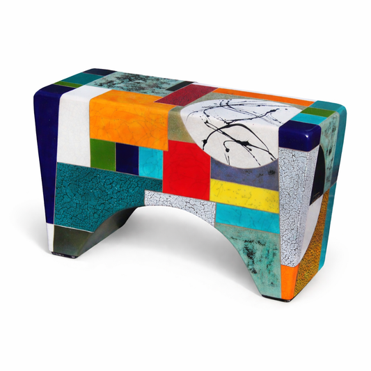 Time Alone Bench – more rectilinear studio raku ceramic bench by Gustavson with bold stacked sections of navy, teal, red, orange, yellow, and crackled white in grid-like clarity, large pale circle with Pollock-inspired splattered marks at top