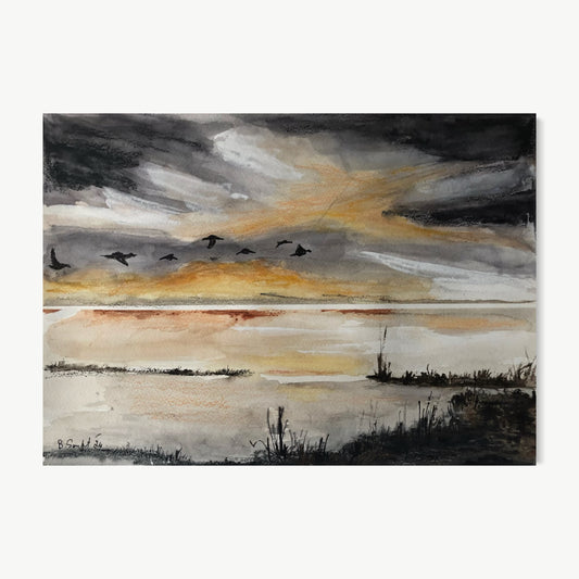 Geese Migrate – watercolor painting by Batia with dramatic storm-break sky of dark clouds opening to amber and gold light over flat coastal wetland, skein of geese crossing in loose formation with reed grass silhouettes below