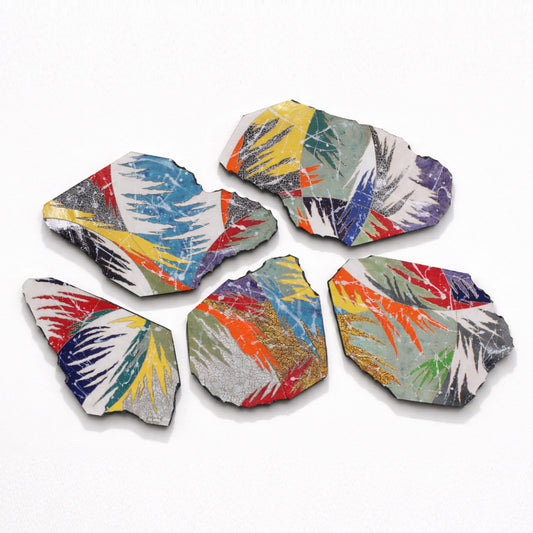 Spring Bloom 5 Part – five-slab ceramic wall installation by Gustavson with vivid reds, yellows, blues, and whites in botanical burst arrangement with deliberate negative space between slabs