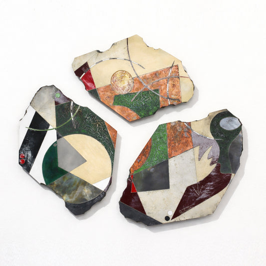 Paris Triptych – three ceramic slab wall piece by Gustavson in deep greens, blacks, warm creams, and passages of rust and burgundy with Cubist geometric forms