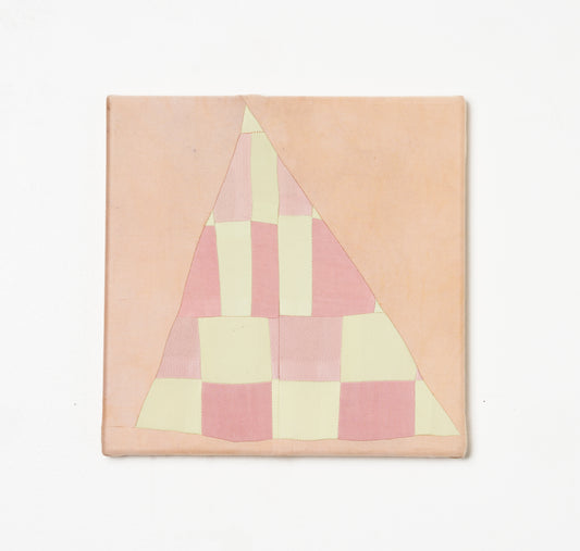 VESSEL V – hand-dyed textile artwork by Panda Landa with gentle patchwork of blush and pale yellow tones forming abstracted vessel shape, careful stitching and restrained palette creating calm visual rhythm inviting quiet reflection