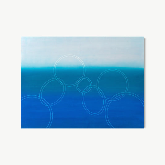 The First Swell – painting by Koury with pale sky transitioning to deep cobalt blue horizon with white-drawn overlapping circles suggesting water rings and energy gathering before breaking