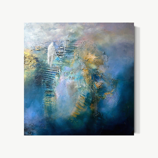 Spirit – mixed media painting by Mary with luminous shimmering vertical presence rising through deep blues and gold, found through layer-by-layer pressing and scraping, meditative and alive breathing differently in different light