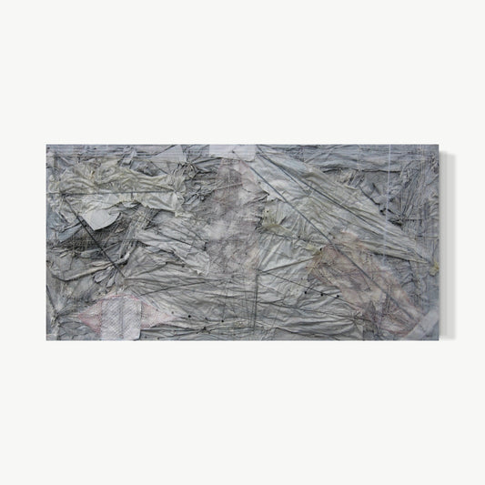 Feeling in With – horizontal relief by Terese Garcia of crumpled and layered cool grey fabric with folds and creases building low relief that catches light unevenly, fine pencil or thread lines at intervals, material speaking without color